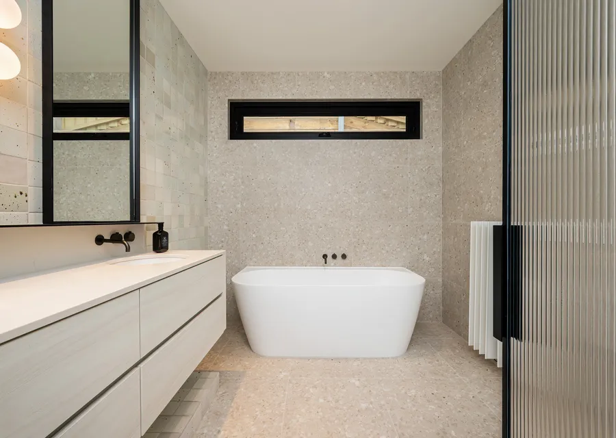 main bathroom with heated floor and towel rails