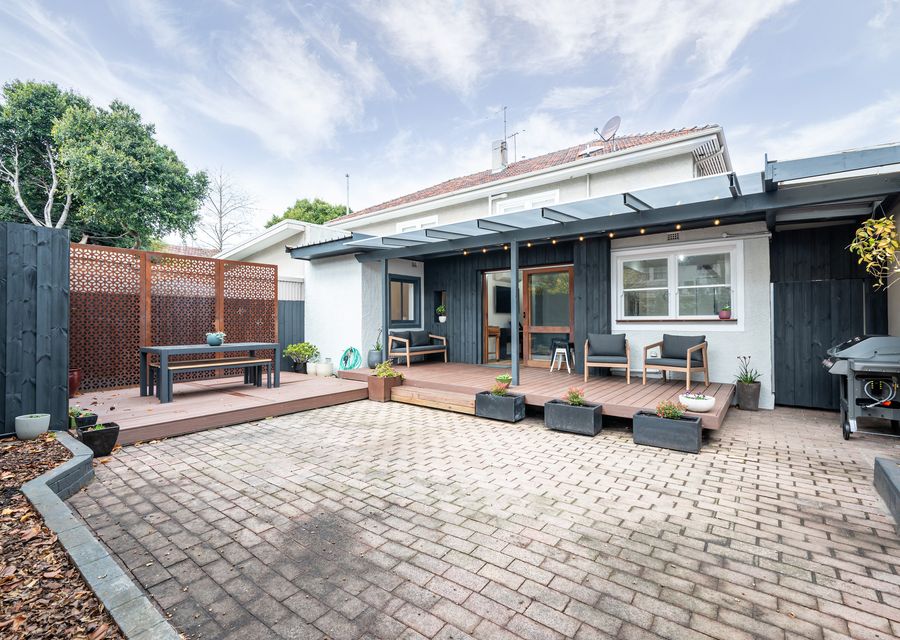 Secure backyard with outdoor dining