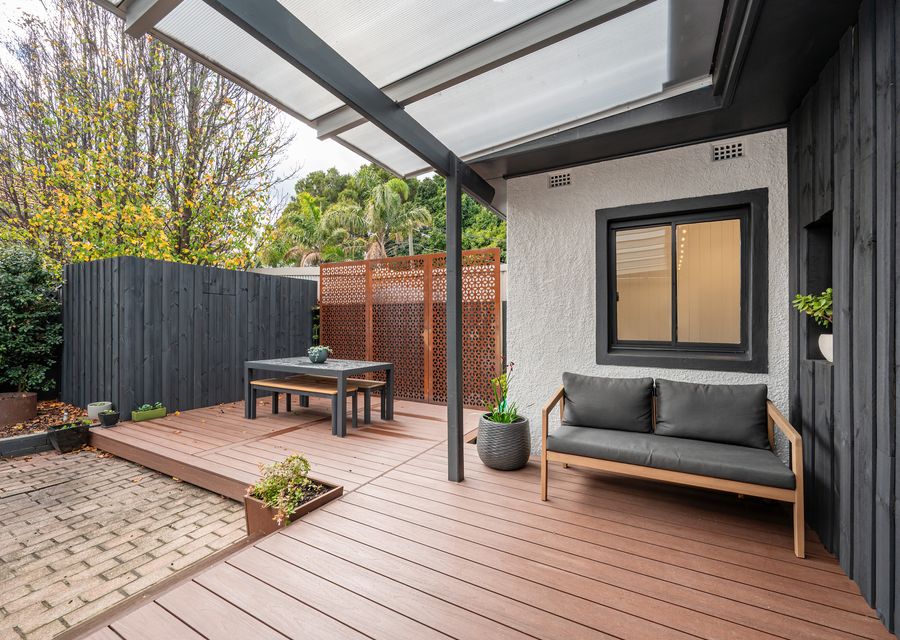 Spacious outdoor secure rear yardwith seating