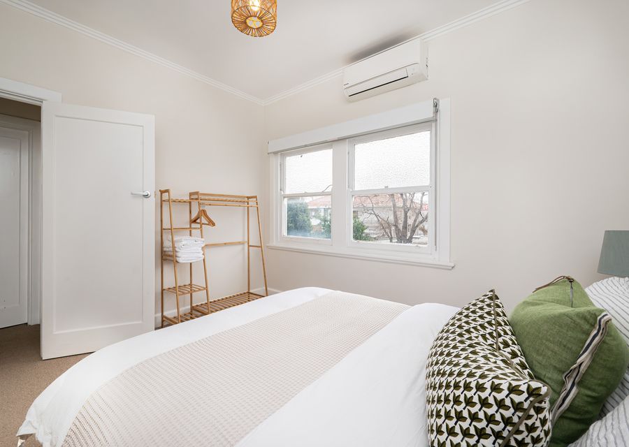 Master bedroom with Queen bed and split system for heating and cooling