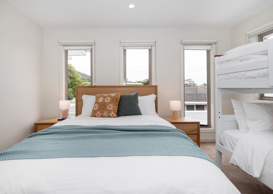 Bedroom three with Queen bed and single bunk beds