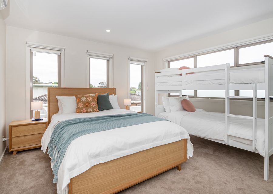 Bedroom three with Queen bed and single bunk beds