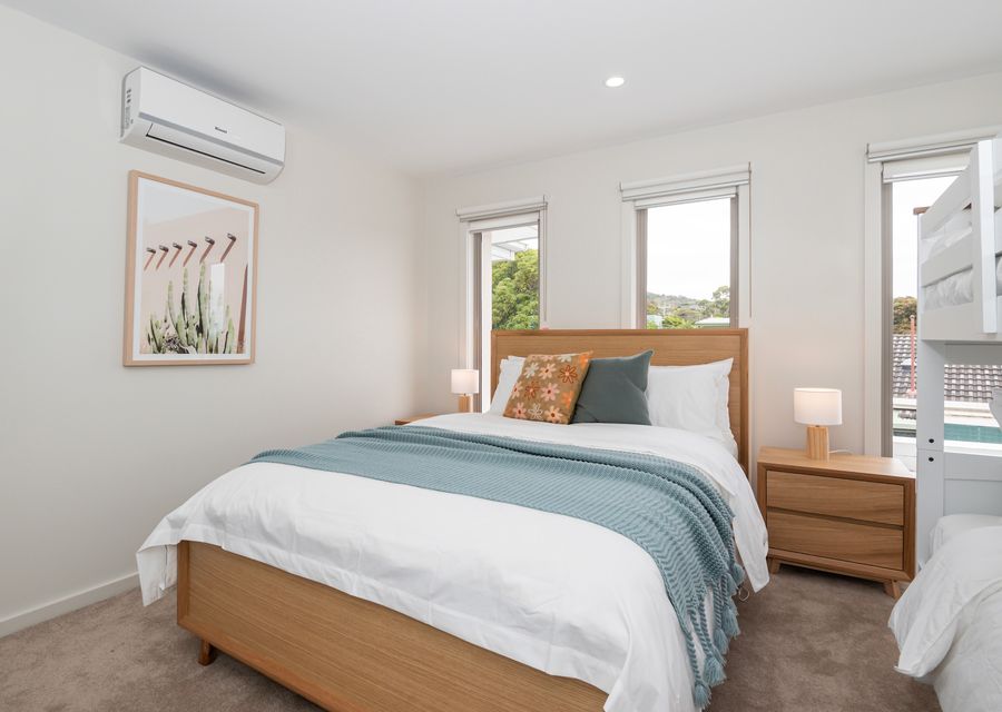Bedroom three with Queen bed and single bunk beds