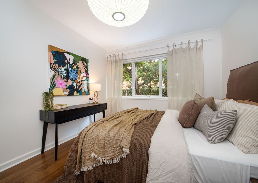 Beautifully  styled bedroom with Queen bed