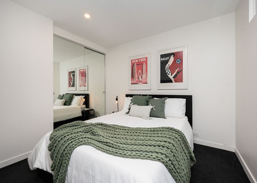 Bedroom with Queen bed. styled with comfort in mind