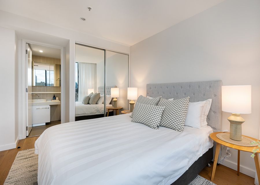 Bedroom two with queen bed and ensuite