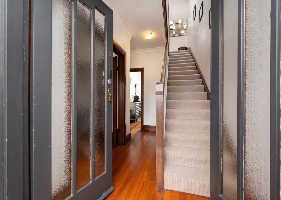 Upstairs to the bedrooms and bathroom 