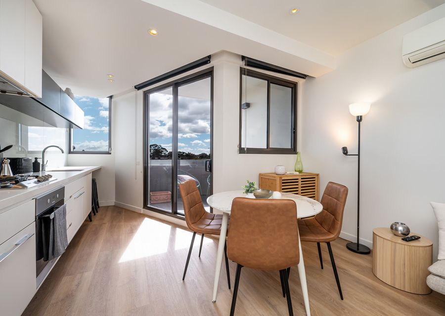 Large glass doors leading out to the balcony