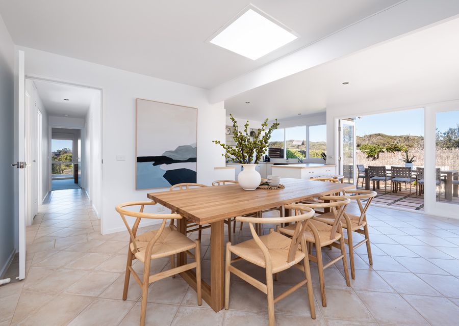 Light and bright living. Dining with seating for 8