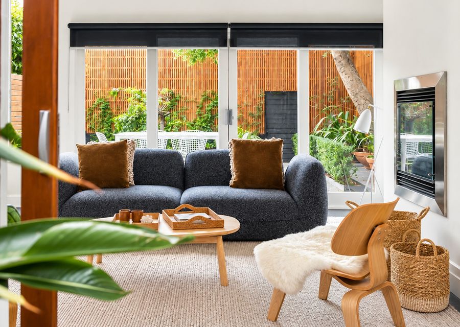 Light-filled living room overlooking the private garden courtyard