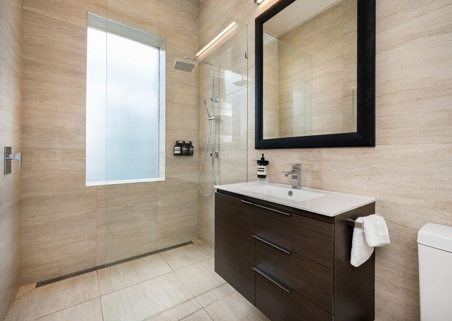Family Bathroom with walk in shower, vanity and toilet