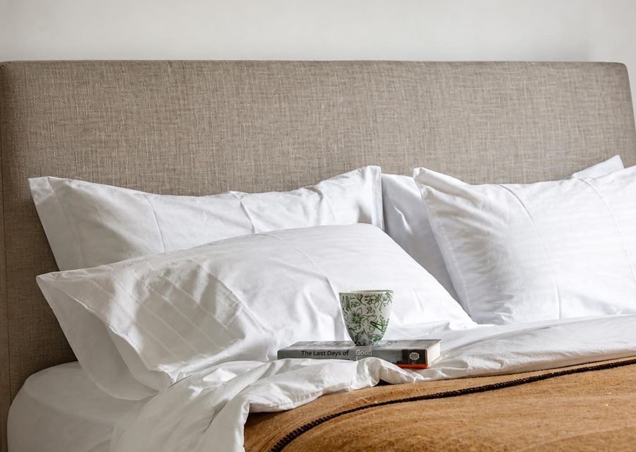 Comfortable bedroom with crisp, inviting linen