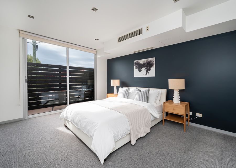 Master bedroom with king bed and ducted heating / cooling