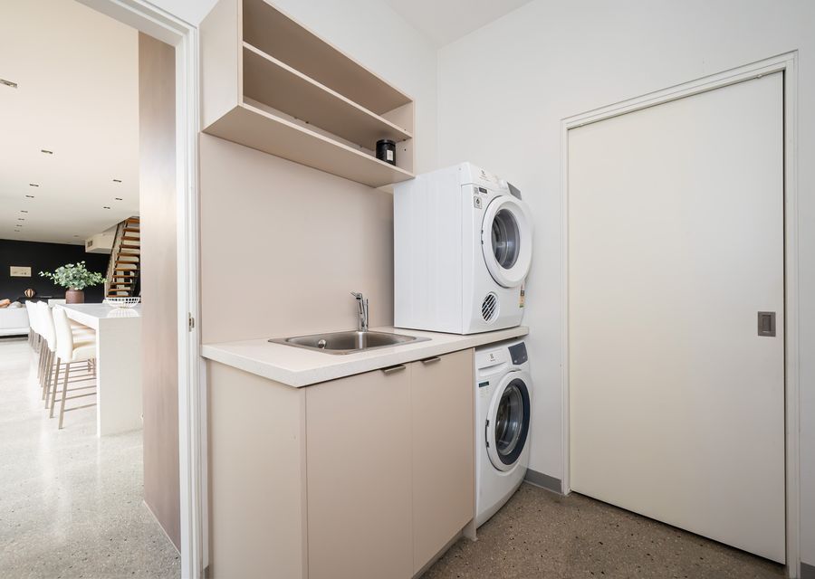 Laundry with separate washer and dryer for your use