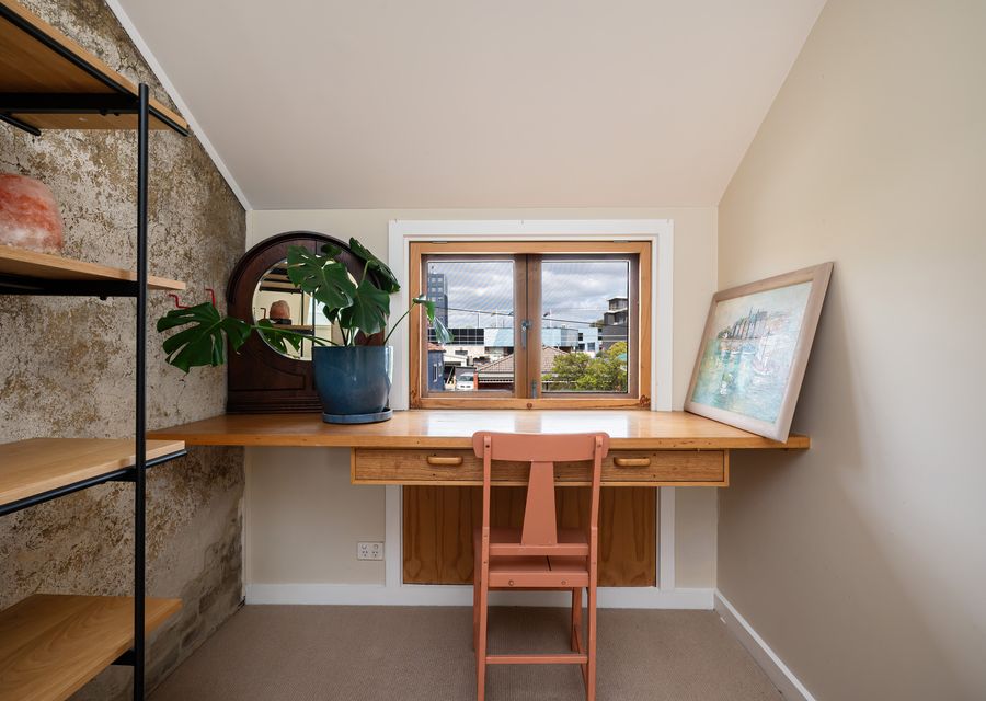 Dedicated desk space with fast Wi-Fi and natural light for remote work or study..