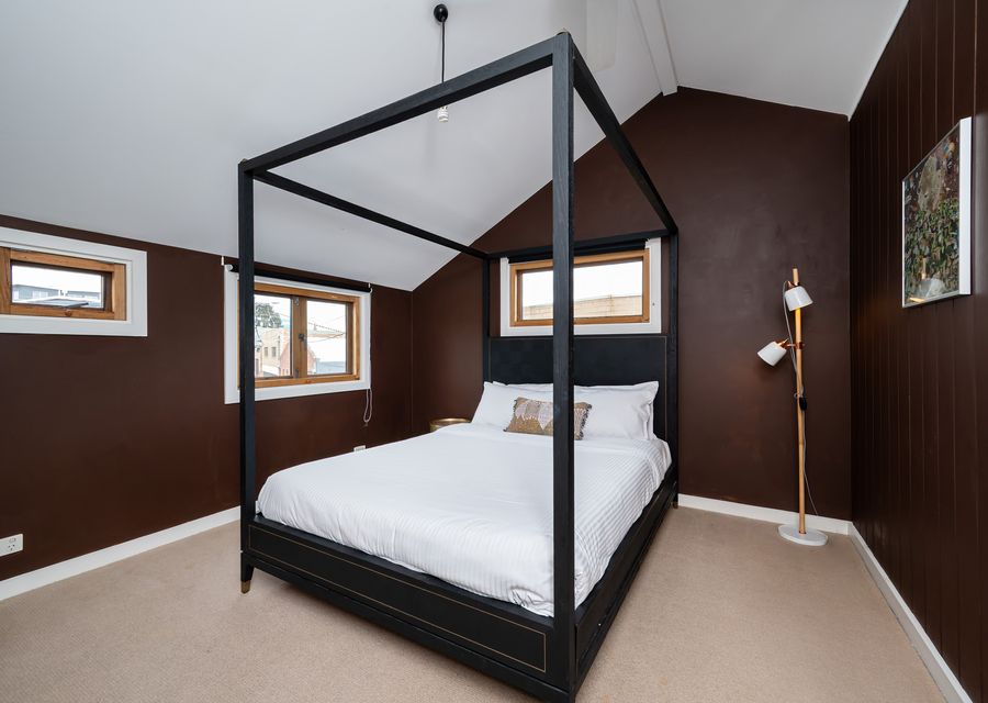 Master bedroom with queen-sized four-poster bed