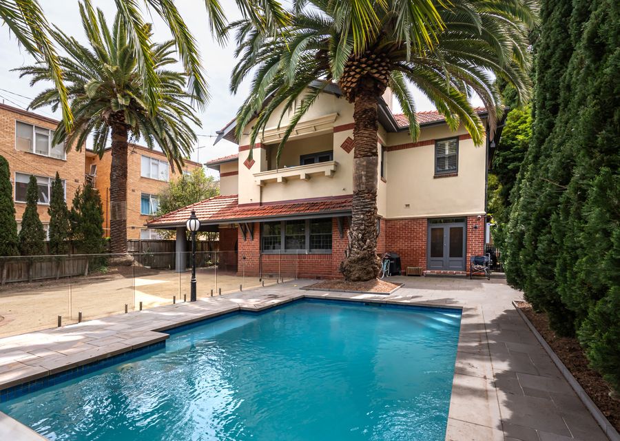 Large secure yard with solar heated pool 