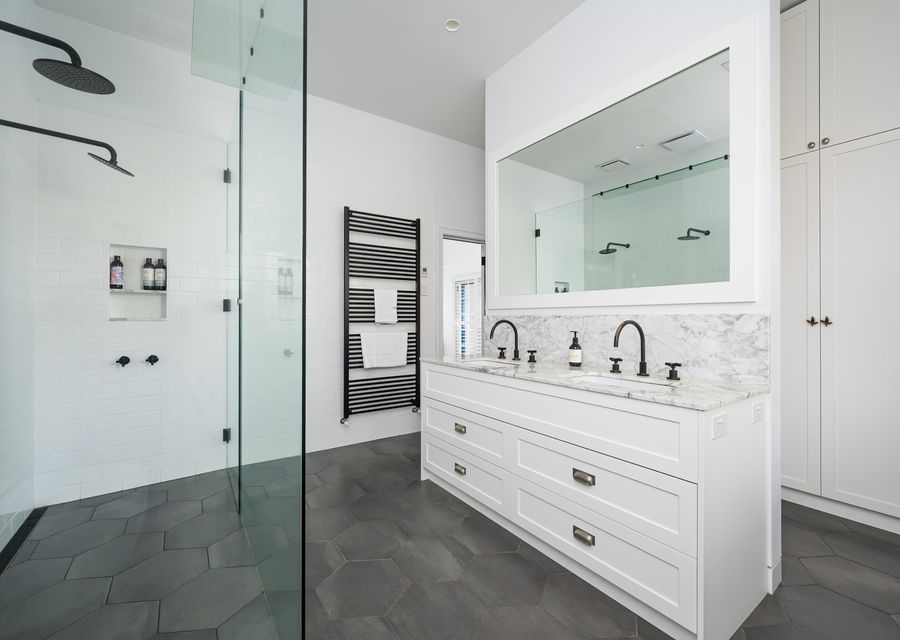 Large bathroom with double shower and double vanity 