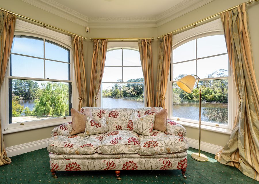 There's a view to the lake from the bedroom too, and with a couch as well 