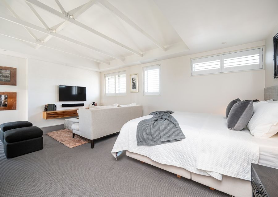 Master bedroom with king bed and own TV