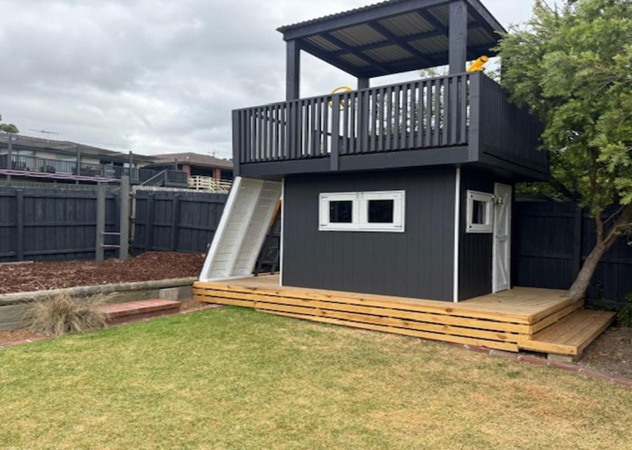 Amazing brand new Cubby for children with slide, climbing  space and monkey bars!