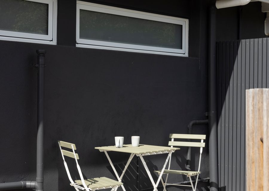 Outdoor seating area near pool