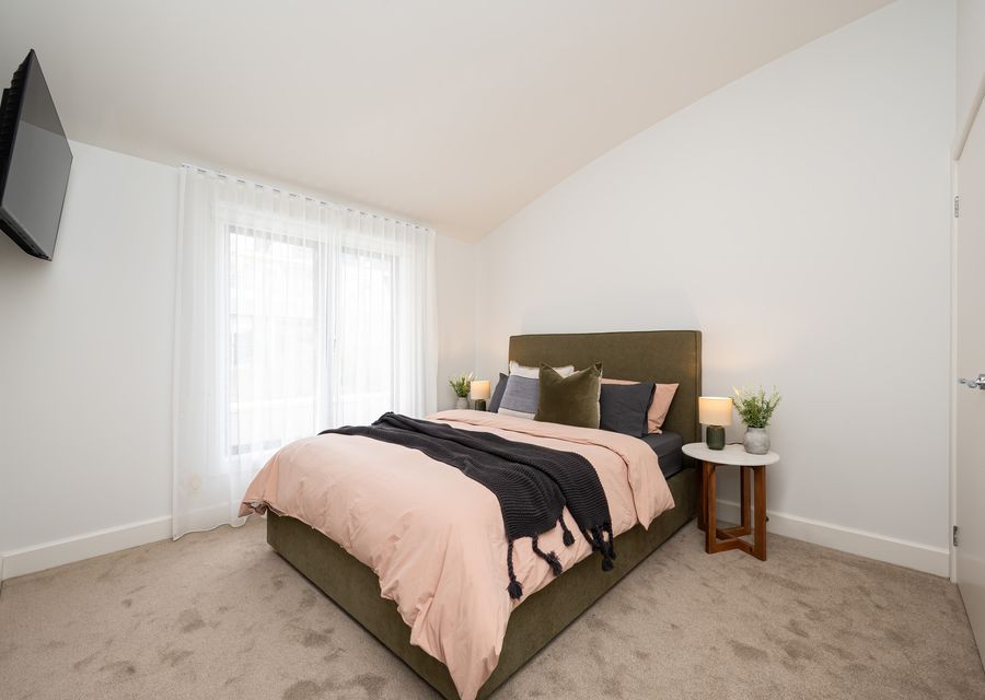 Master bedroom with Queen bed, built in robes and smart TV
