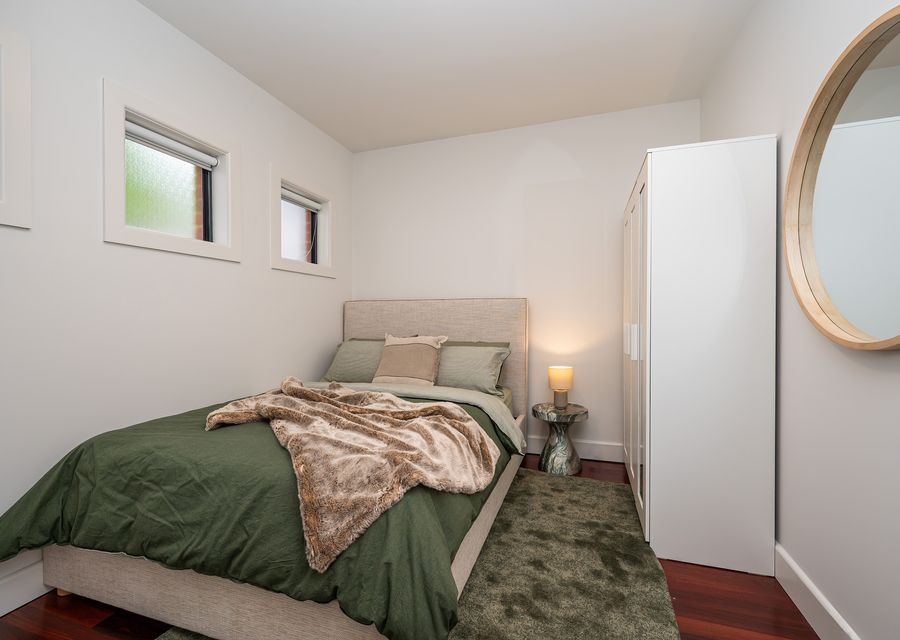 Bedroom 2, upstairs with Queen bed, split system for heating and cooling and electric radiator