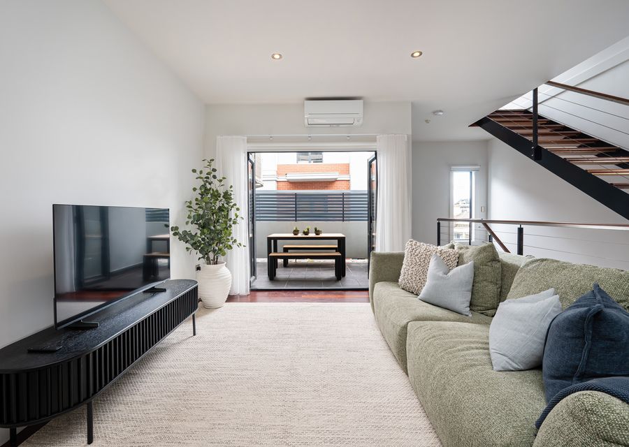 Smart TV in living space and split system for heating and cooling