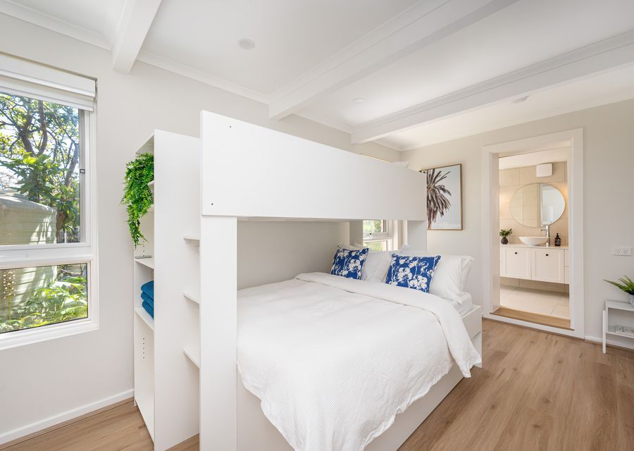 Bedroom four with tri bunk bed and trundle bed