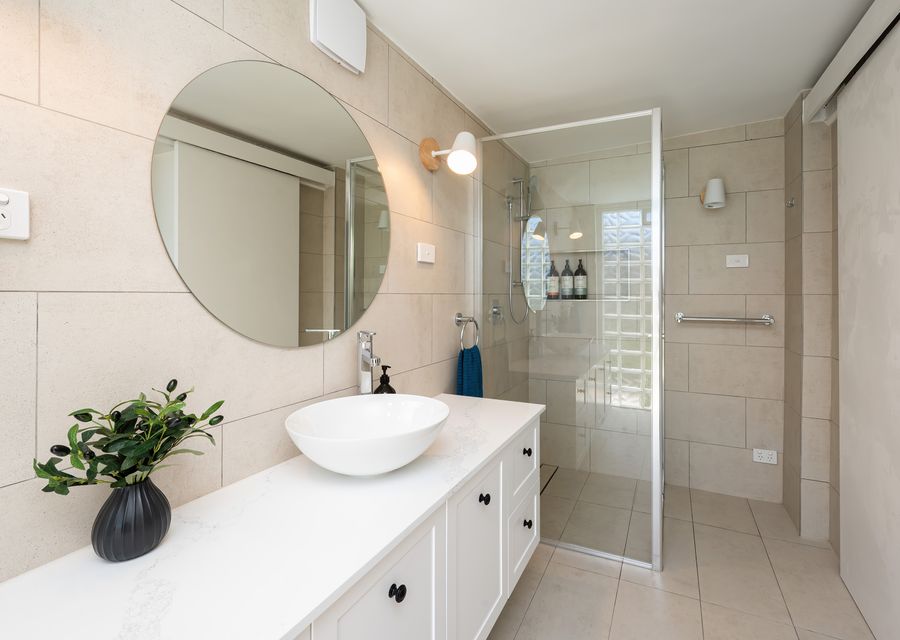 Downstairs bathroom with walk in shower