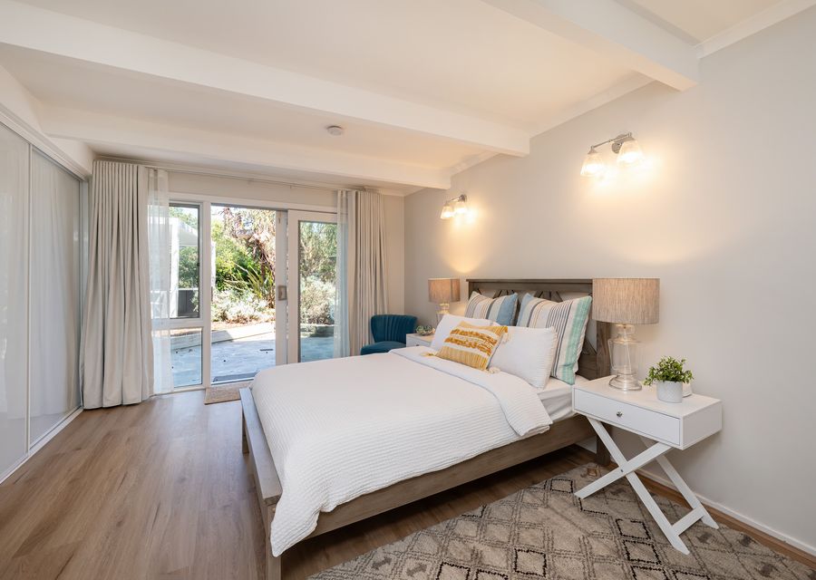 Downstairs to bedroom three with double bed