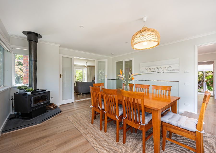 Dining area for eight with wood fireplace
