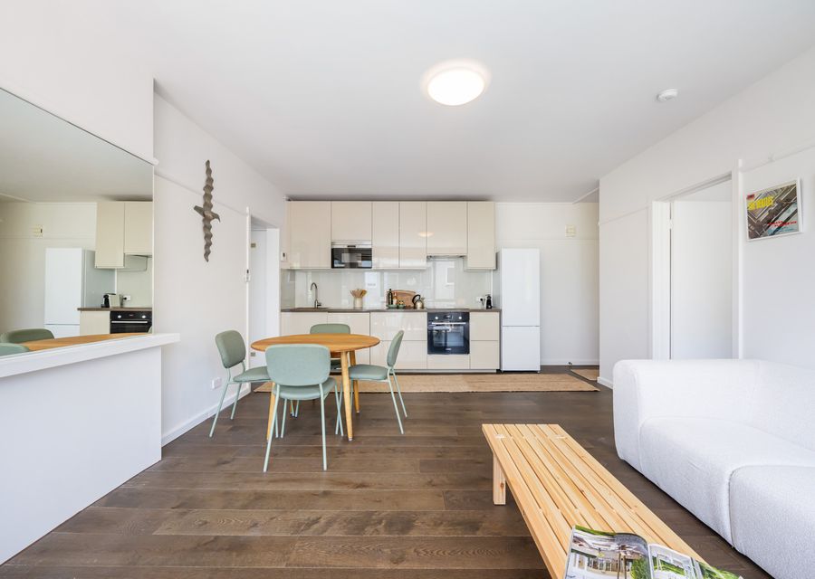 Spacious open-plan kitchen, dining, and living area.