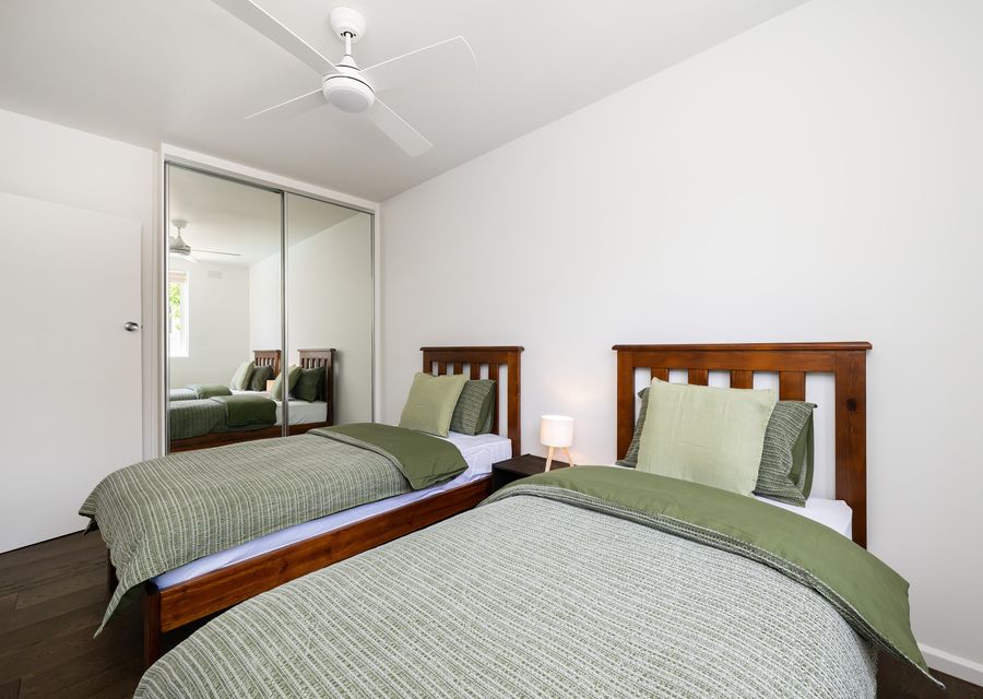 Bedroom two with 2 Single beds