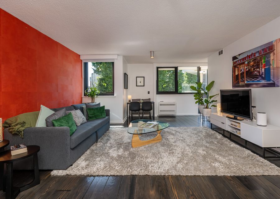 Open-plan living area adjacent to the dining table.