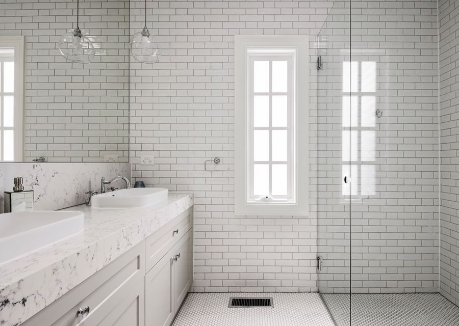 Family bathroom with double vanity and walk in shower