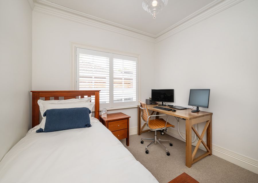 Bedroom 4 with single bed, and dedicated study space