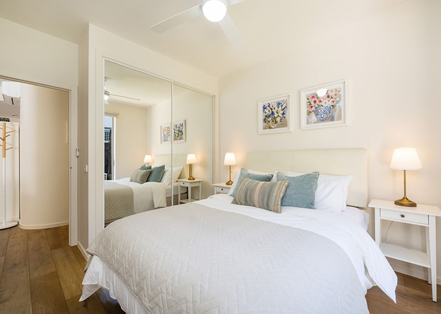 Queen Bedroom with built in wardrobe and TV