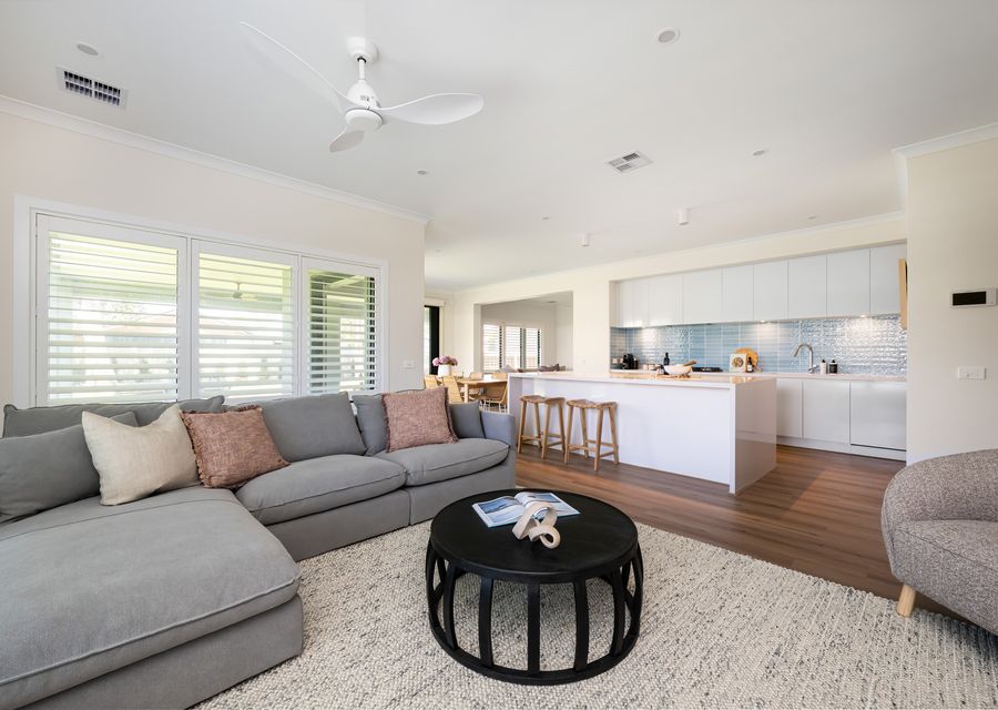 Living area and kitchen at the back 