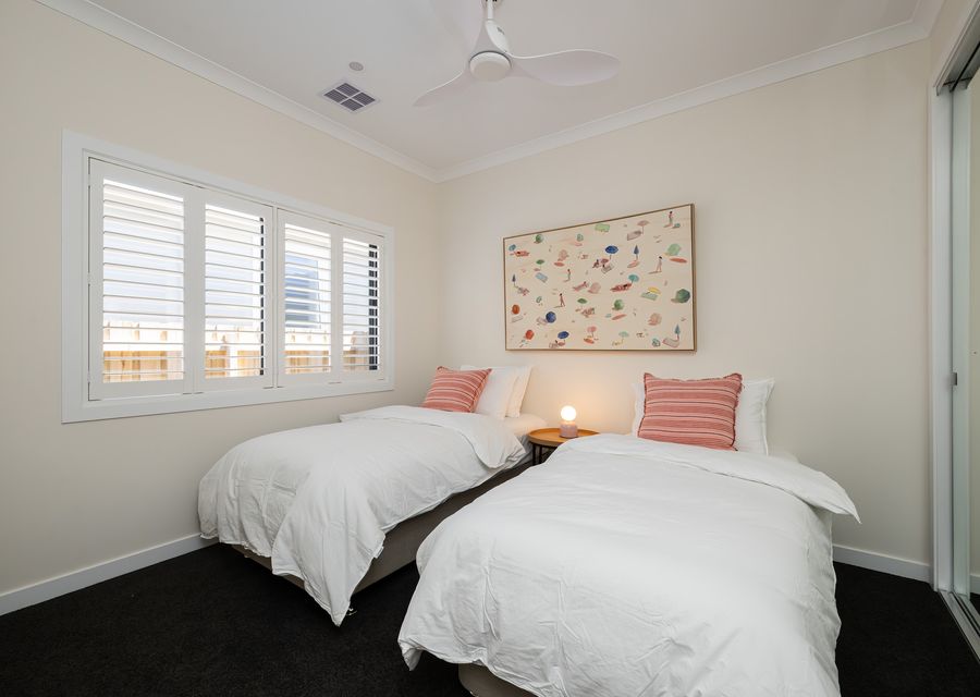 Bedroom five with two single beds 