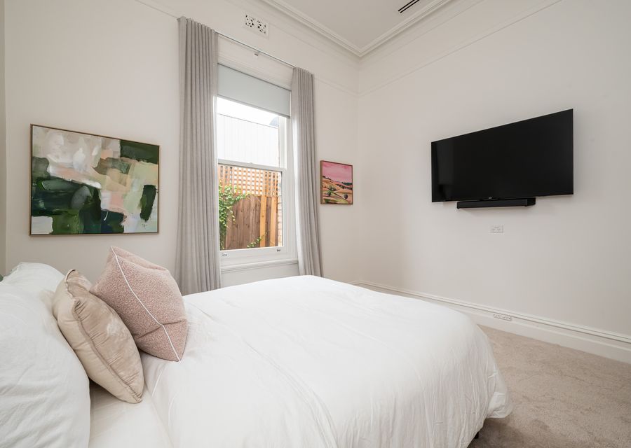 Third bedroom with a TV