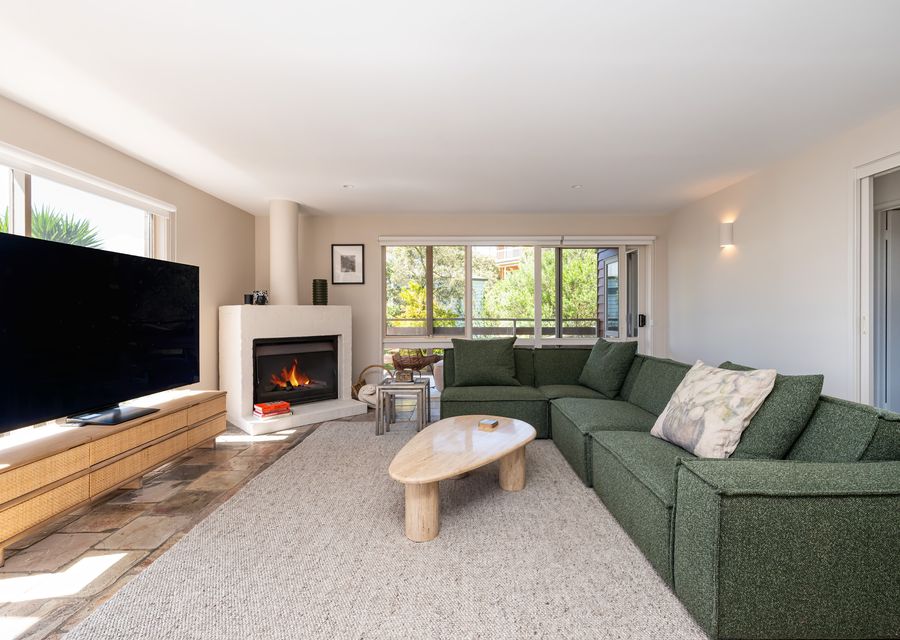 Lounge area with the fireplace and TV