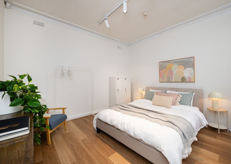 Bedroom three with queen bed