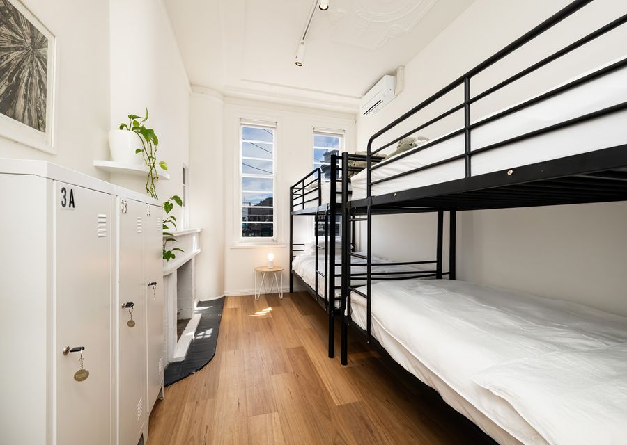 Bedroom six with two king single bunks