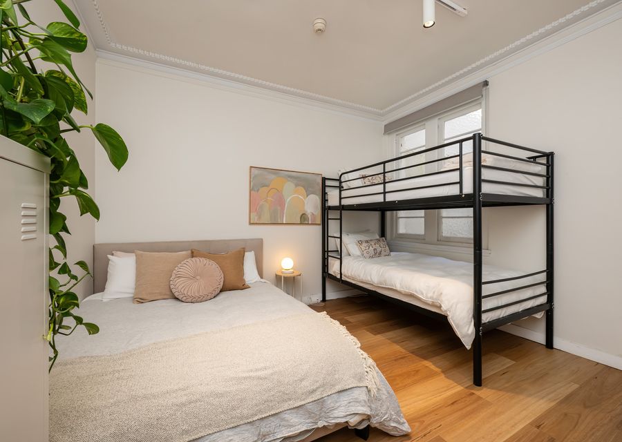 Queen bed with single bunk bed.