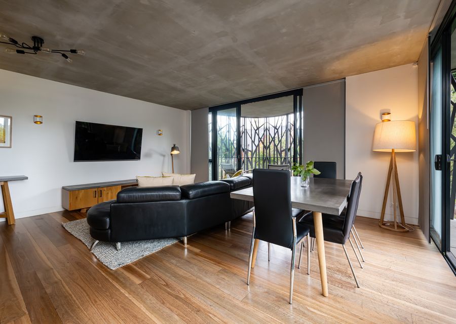 Open plan living area adjacent to dining area