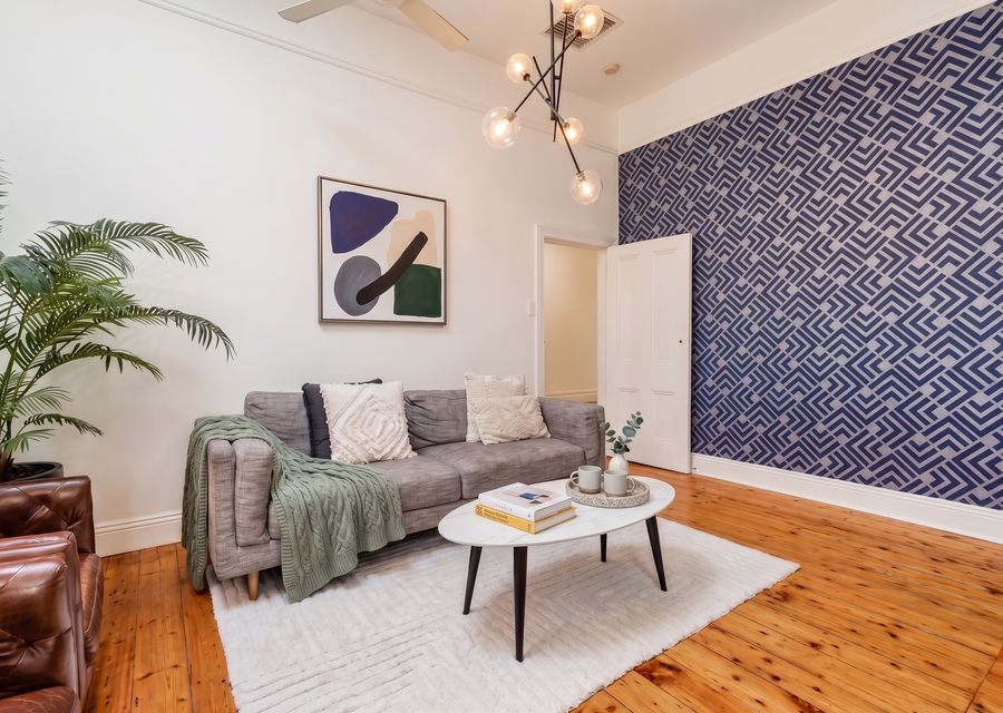 Beautiful living room with split system and ceiling fan