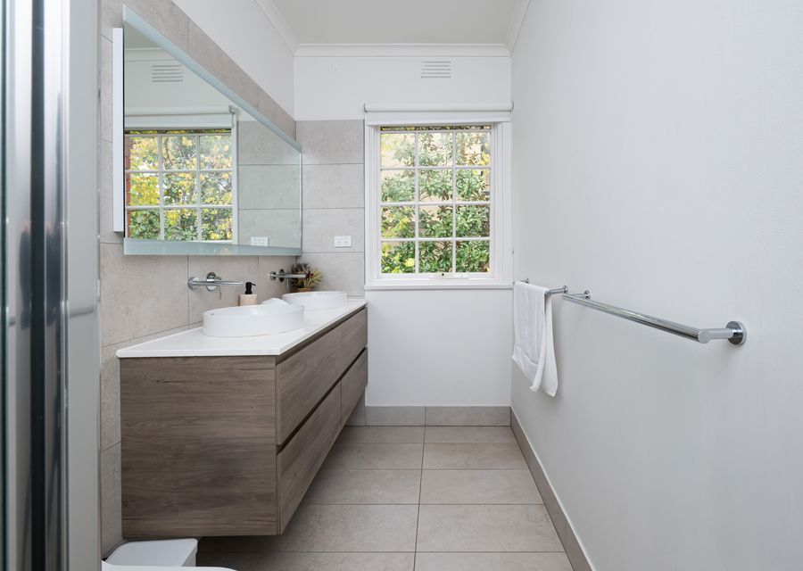 Spacious bathroom with complimentary essentials.