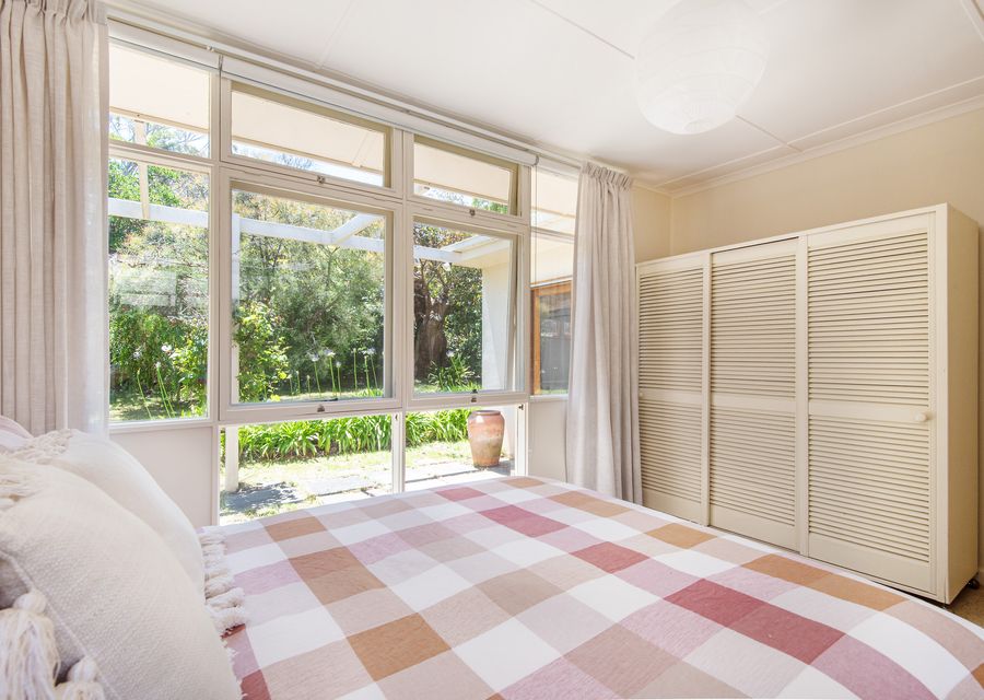 Queen bedroom with cabinets